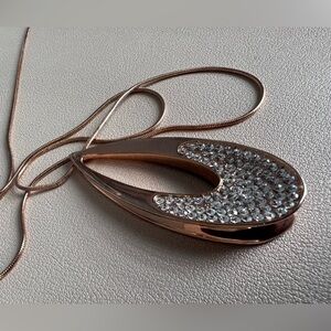 Rose gold tone crystal pendant necklace